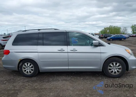 2010 Honda Odyssey Ex z USA, uszkodzony, nr VIN 5FNRL3H44AB101312